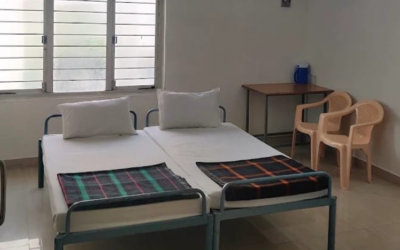 2-single-beds-at-nandakam-rest-house-tirumala