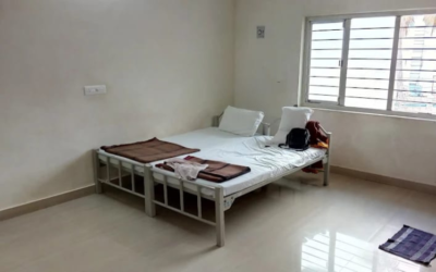 AC Room with 2 single Size Beds at Nandakam Rest House Tirumala